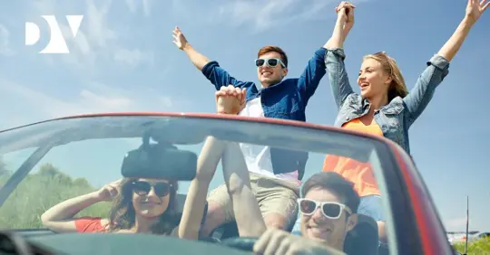 friends in a car driving